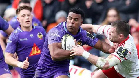 Immanuel Feyi-Waboso in action for Exeter against Munster