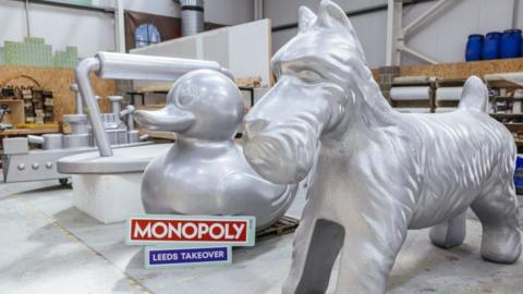 The life-sized Monopoly tokens