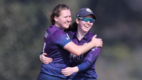 Scotland captain Kathryn Bryce celebrates a wicket with team-mate Katherine Fraser
