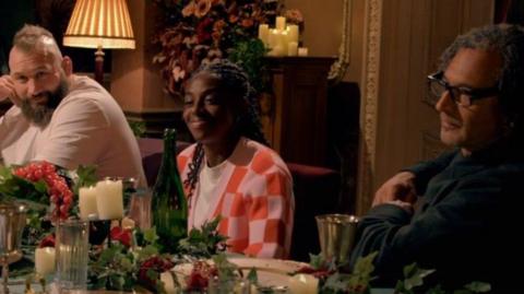 Celebrity Traitors at a lavish meal