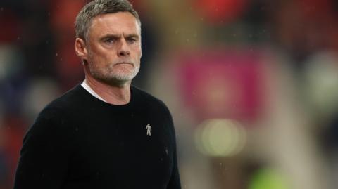 Bradford City boss Graham Alexander watches on during a League One match