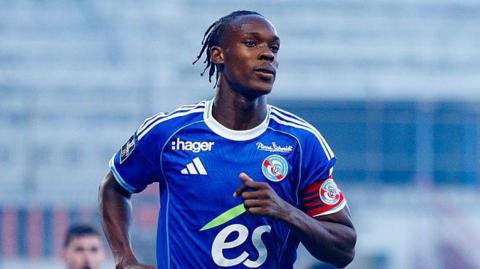 Emanuel Emegha runs in Strasbourg kit