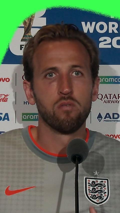 Harry Kane looking at reporters as he answers questions in a post-match press conference.