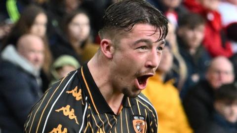 Charlie Hughes celebrates scoring