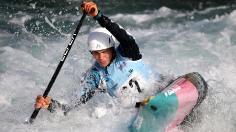 British canoeist Kurts Adams Rozentals competing in canoe slalom