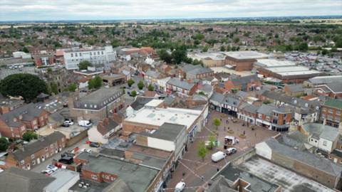 An aerial view of Spalding town centre. The pedestrian zone is in the centre of the picture.