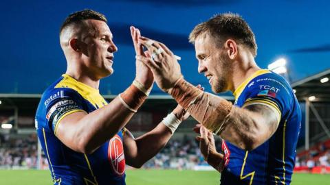 Matt Dufty and Josh Drinkwater of Warrington celebrate the win