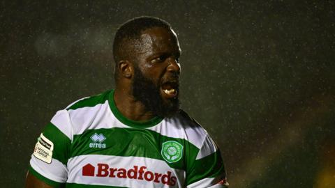 Junior Morias celebrates scoring Yeovil's winner at Solihull Moors