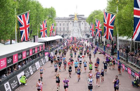 Runners about to cross the finish line at the 2025 London Marathon