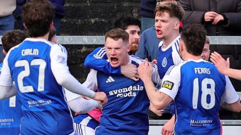 Paddy Burns celebrating his goal 