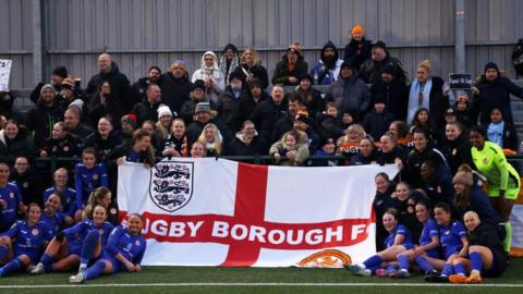 A picture of the Rugby Borough team and their supporters