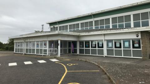 A tired looking building that will be transformed into a Gympanzee permanent gym for children with disabilities.