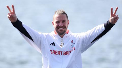 Ben Pritchard poses after winning gold in the Pr1 Men’s Single Sculls at the Paris 2024 Summer Paralympic Games