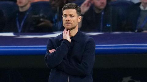 Xabi Alonso looks on during Real Madrid's game against Manchester City in the Champions League