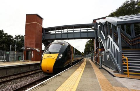 A GWR train stopped at the platform at Ashley Down Station in Bristol