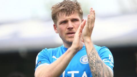 Will Collar applauds the Stockport County fans