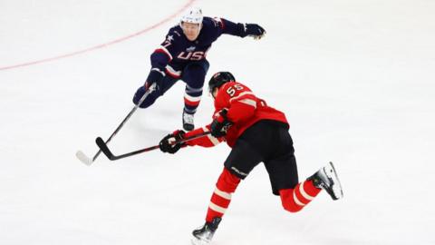 A photo of Team Canada vs Team USA on the ice on February 15 in Montreal