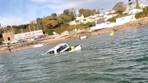 Pickup truck in the sea