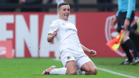 Boreham Wood's Jeff King celebrates scoring a goal