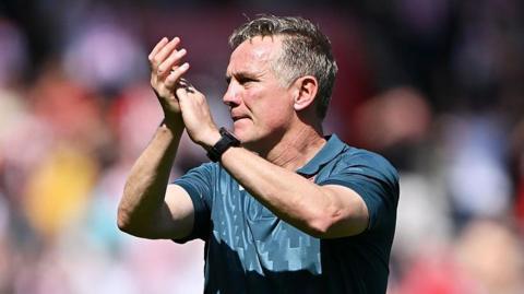 Wrexham manager Phil Parkinson applauds