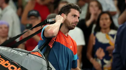 Cameron Norrie celebrates