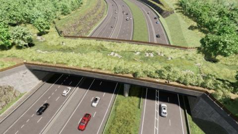 Concept image of the Missing Link scheme. The road can be seen underneath a bridge which is covered in greenery.