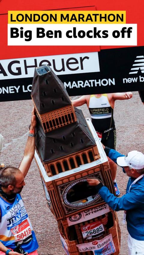 Lukas Bates struggle to cross the finish line dressed as Big Ben