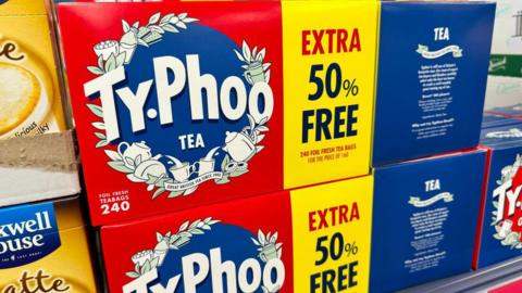 A close up of a box of 240 Typhoo teabags on a supermarket shelf