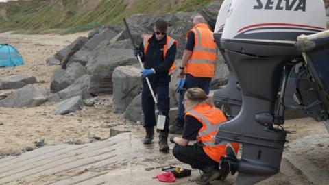 Anglian Water taking samples at East Runton