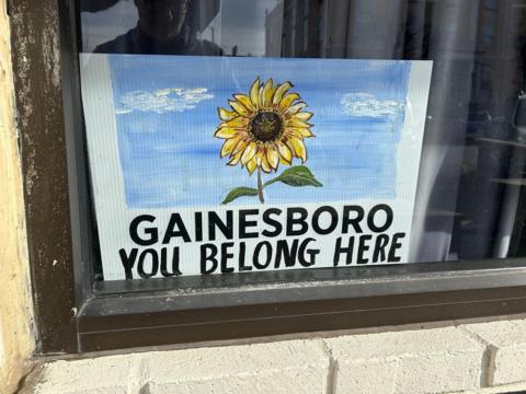 a picture of a sunflower and the slogan "Gainesboro: You belong here"