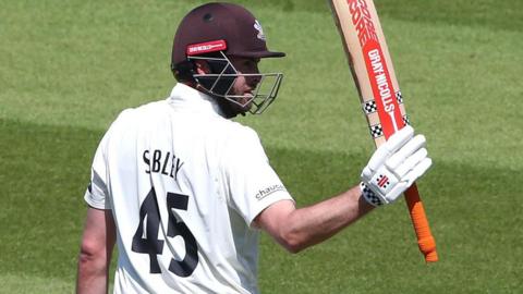 Dom Sibley celebrates scoring fifty