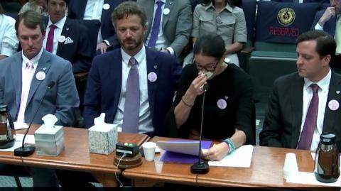 Parents are talking to a committee.