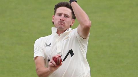 Nathan Smith bowling
