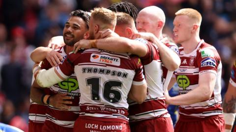 Wigan celebrate Bevan French's try