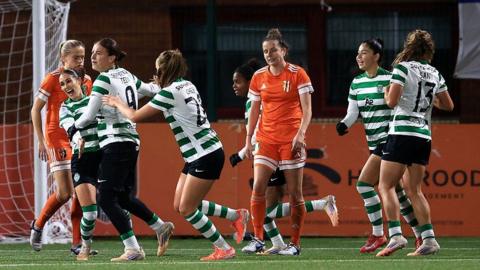 Telma Encarnacao of Sporting Clube de Portugal celebrates scoring her team's first goal with teammates during the UEFA Women's Europa Cup 2025/26 Round of 16, first leg match between Glasgow City FC and Sporting Clube de Portugal at Petershill Park on November 12, 2025 in Glasgow, Scotland
