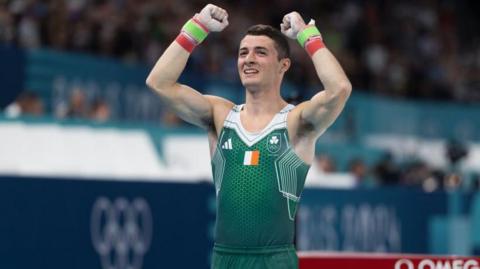 Rhys McClenaghan celebrates 