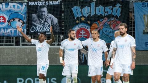 Slovan celebrate Cesar Blackman's (left) goal against FC Midtjylland