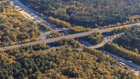 A bird's eye view of the M25 junction 10 and A3 Wisley interchange.