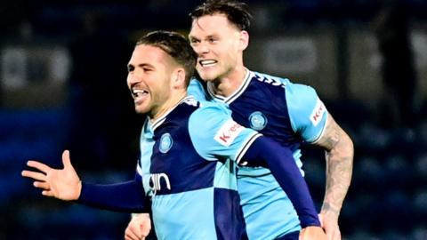 Luke Leahy celebrates his winning goal for Wycombe Wanderers