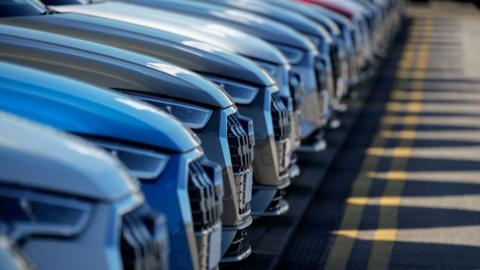 Cars in car forecourt
