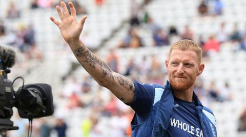 Ben Stokes waves to the crowd while being filmed