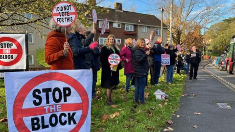 Protesters on East Wonford Hill in Exeter