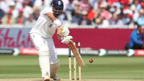 England opener Emilio Gay plays a shot