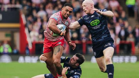Leigh Leopards playing Wigan Warriors in Super League in July