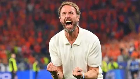 England manager Gareth Southgate screaming with joy after England victory.