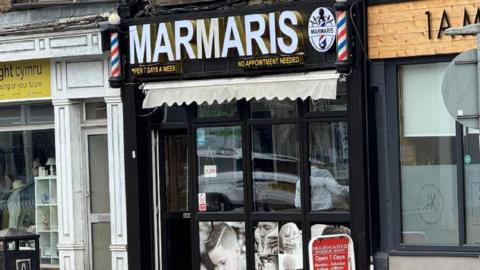 Shop front of a barber shop in Caerphilly County, south Wales. Marnaris barber shop was the scene of a mass brawl involving several men who were fighting over plans to open a new barber shop in nearby Newbridge.