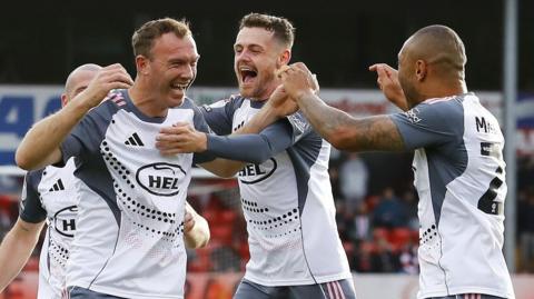 Exeter City celebrate a goal