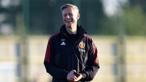 David Hughes smiles during a training session at Manchester United