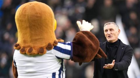 Tony Mowbray was greeted by his old friend Baggie Bird when he was reintroduced to the crowd before the game at The Hawthorns