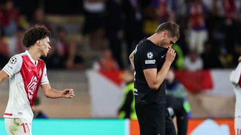 Micky van de Ven reacts during match